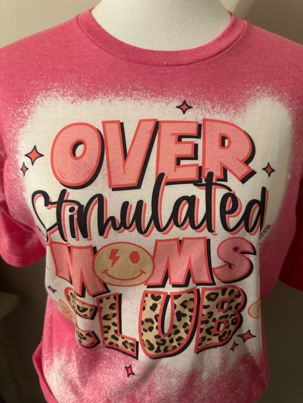 Over Stimulated Moms Club Tee